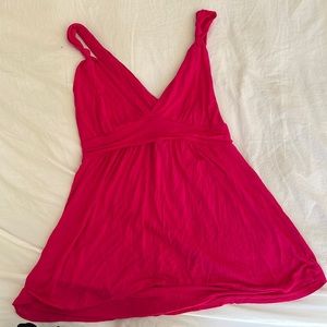 Cute pink tank camisole with nodded detail and crisscross back